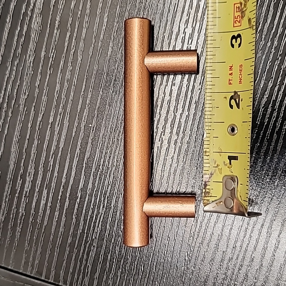 (18) Copper color door pulls. All 18 for 1 price
